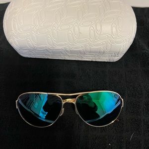 Oakley gold aviators with blue green lens